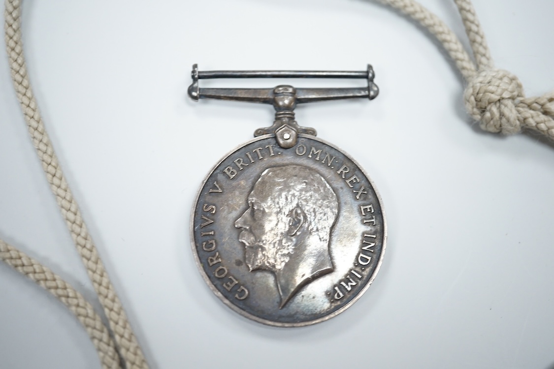 A cased WWI compass, an RG watch and a medal awarded to 33486 PTE. N. FRANCE. LING. R.